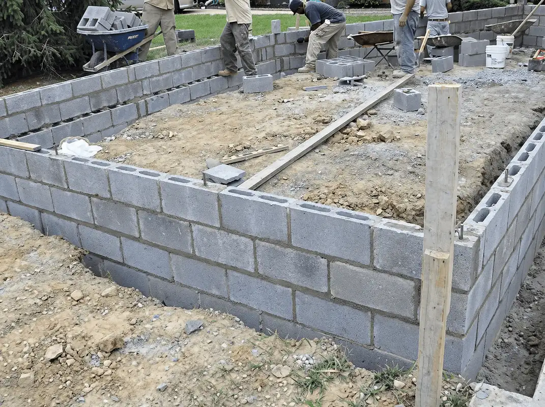Professionals building a foundation with blocks in Tacoma, WA