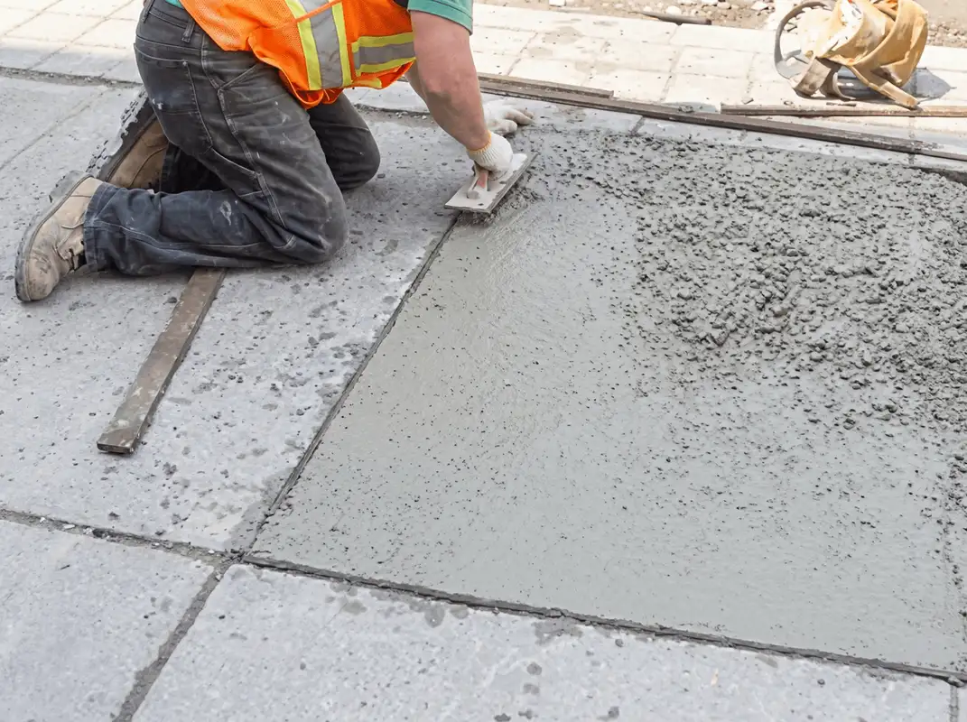 Professional repairing a concrete floor in Tacoma, WA